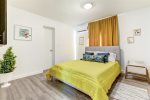 Master bedroom renders a queen-sized bed -best for couples-